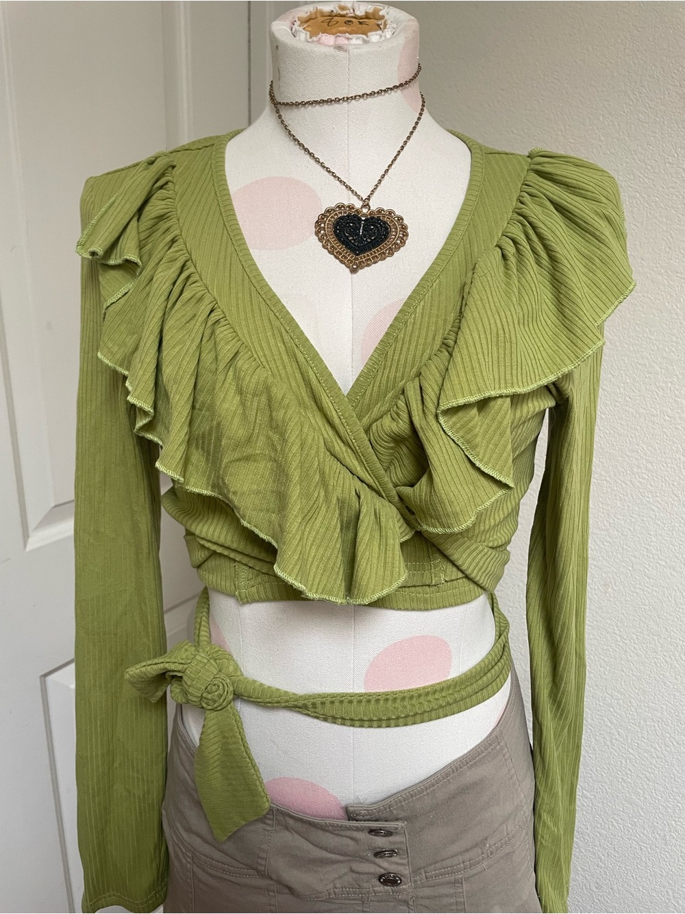 Green ruffle top